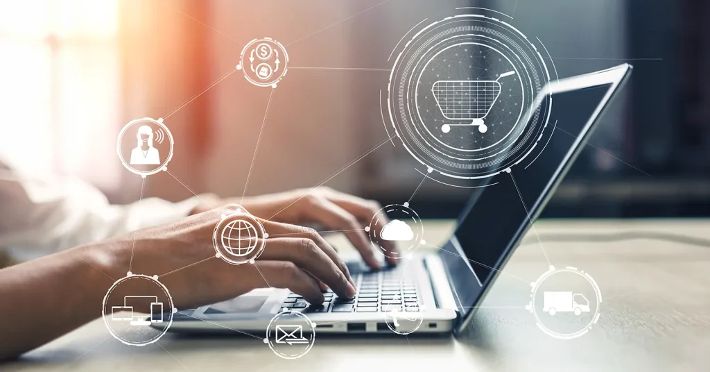 strategi internet marketing untuk UMKM dengan laptop menampilkan grafik pertumbuhan, ikon media sosial, dan simbol SEO.